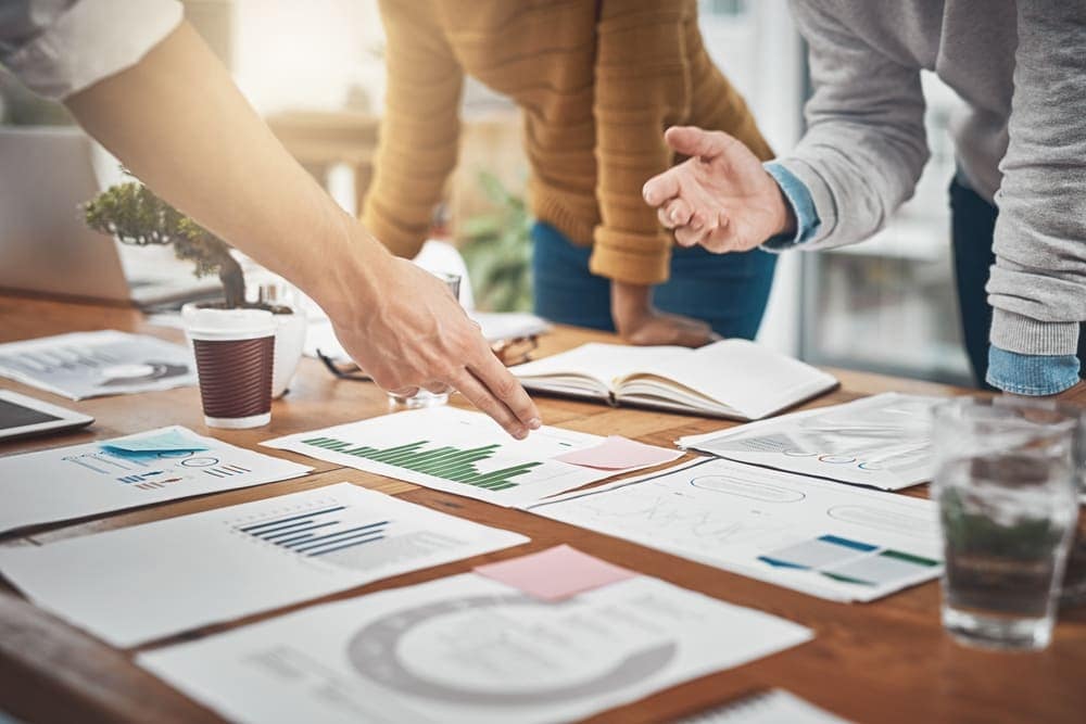 A corporate group discussing analytics