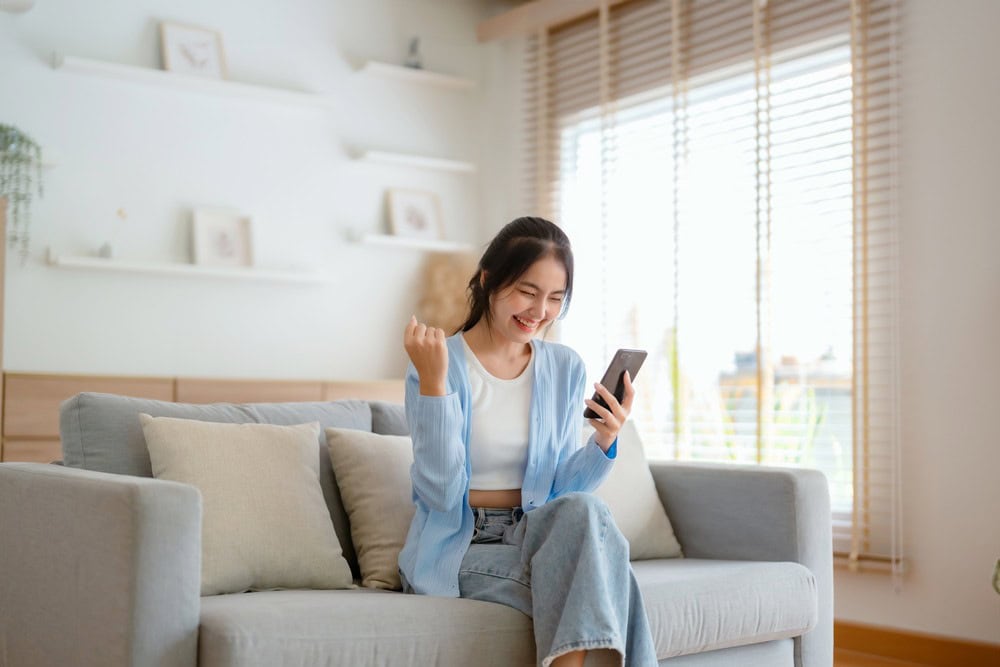 A woman explores a digital customer experience strategy